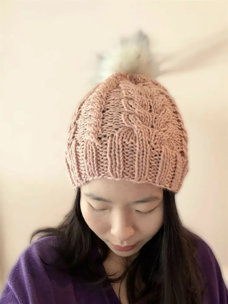 Cable Hand Knit Slouchy Beanie in beige pink with white fur pompom